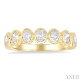 1.00 Ctw 7-Stone Bezel Set Oval Cut Diamond Fashion Band in 14K Yellow Gold